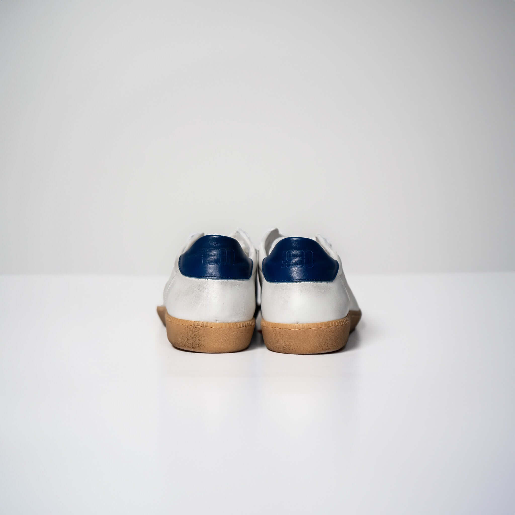 Rear view of Harvard Leather sneakers with Italian rubber soles and fine Italian leather uppers, showcasing distinctive style and comfort.