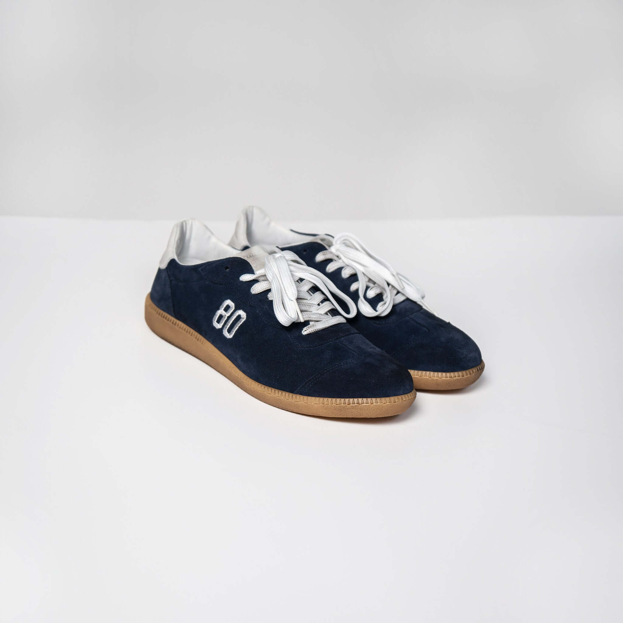 Harvard Suede sneakers in navy blue with Italian rubber sole and white laces, showcasing Made in Italy craftsmanship and quality.