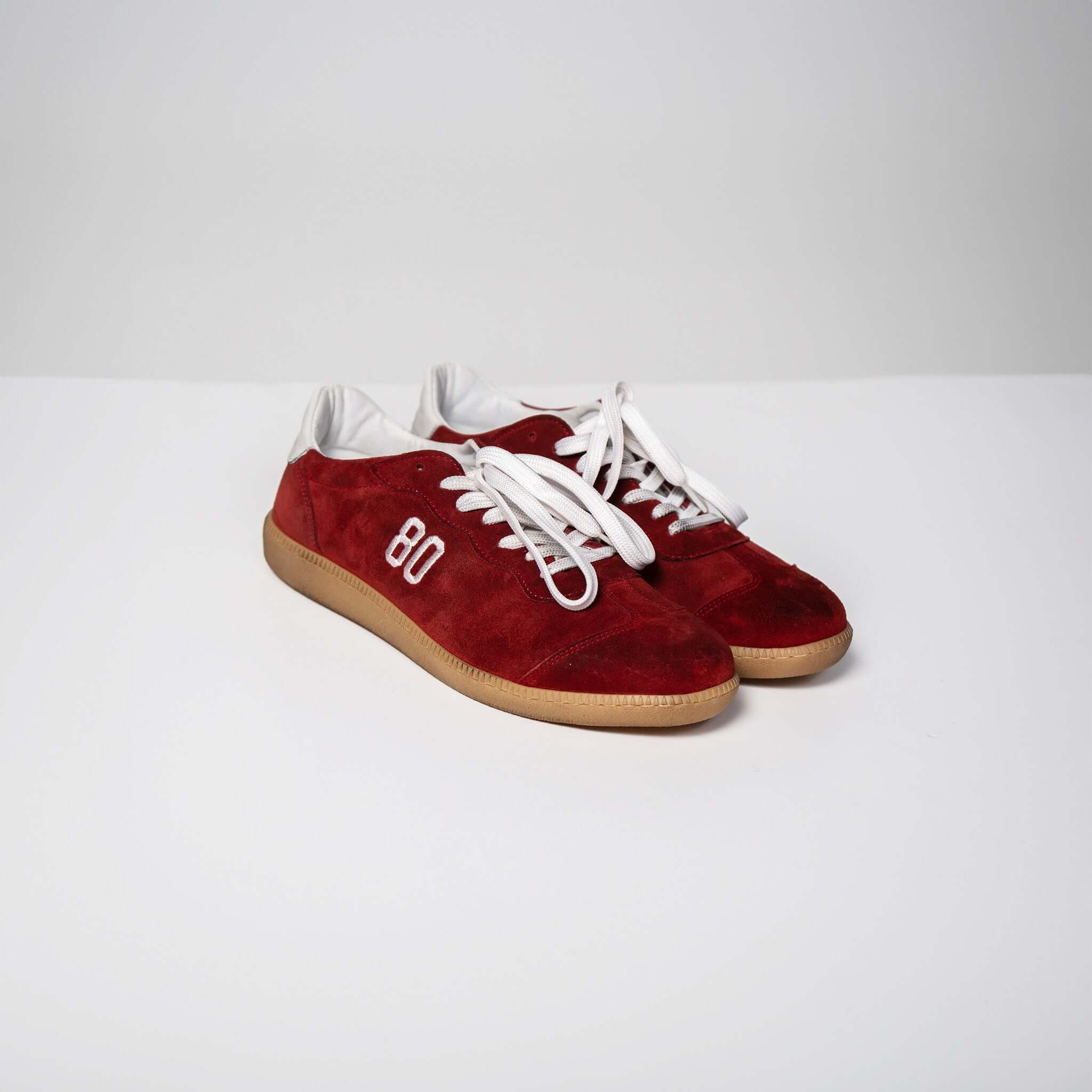 Harvard Suede Sneakers in red with white laces, Italian rubber sole, and raised insole for optimal support and comfort. Made in Italy.