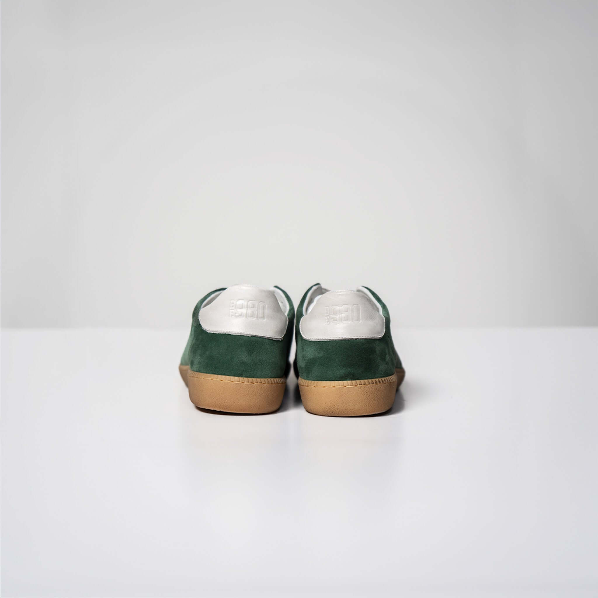 Rear view of Harvard Suede sneakers in green, showcasing fine Italian suede upper and rubber sole, made in Italy for style and comfort.